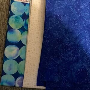 Three 1-yard pieces of fabric.  Perfect for 3 yard quilt.  Fabric complimentary.